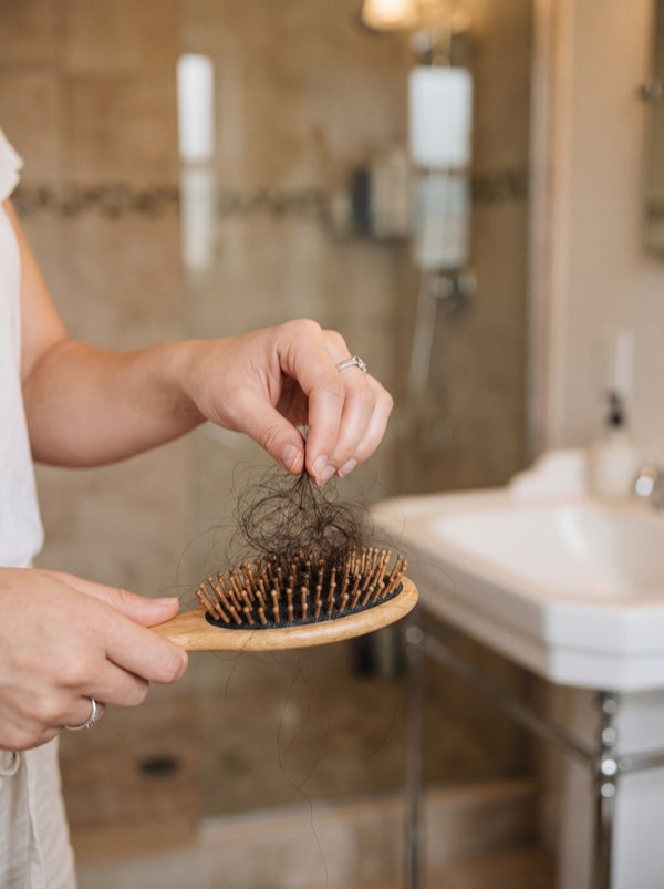 Hair shedding from brush - postpartum hair loss
